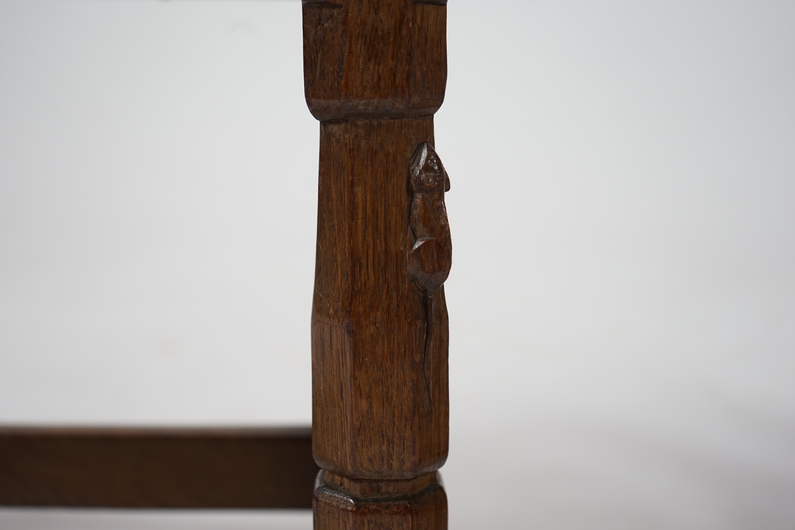 A pair of Robert 'Mouseman' Thompson burr oak stools, 1930s